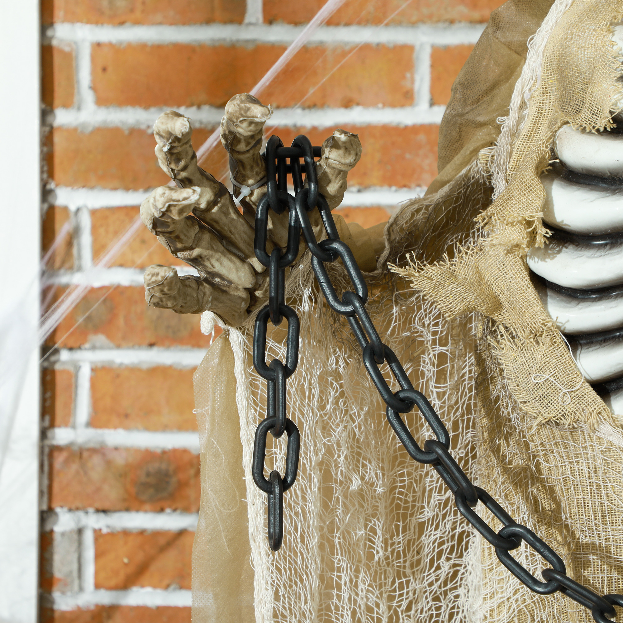 Halloweendekoration, Hängendes Skelett, leuchtender Kopf, unheimliches Heulen, biegsame Arme, Khaki